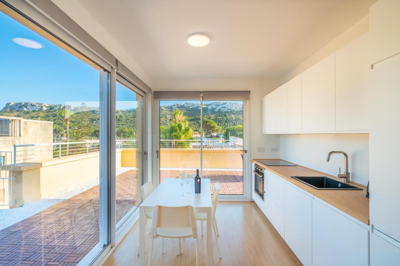 Terrazza Sella Del Diavolo - Vista Mare - Wifi Ac Apartment กาญารี ภายนอก รูปภาพ
