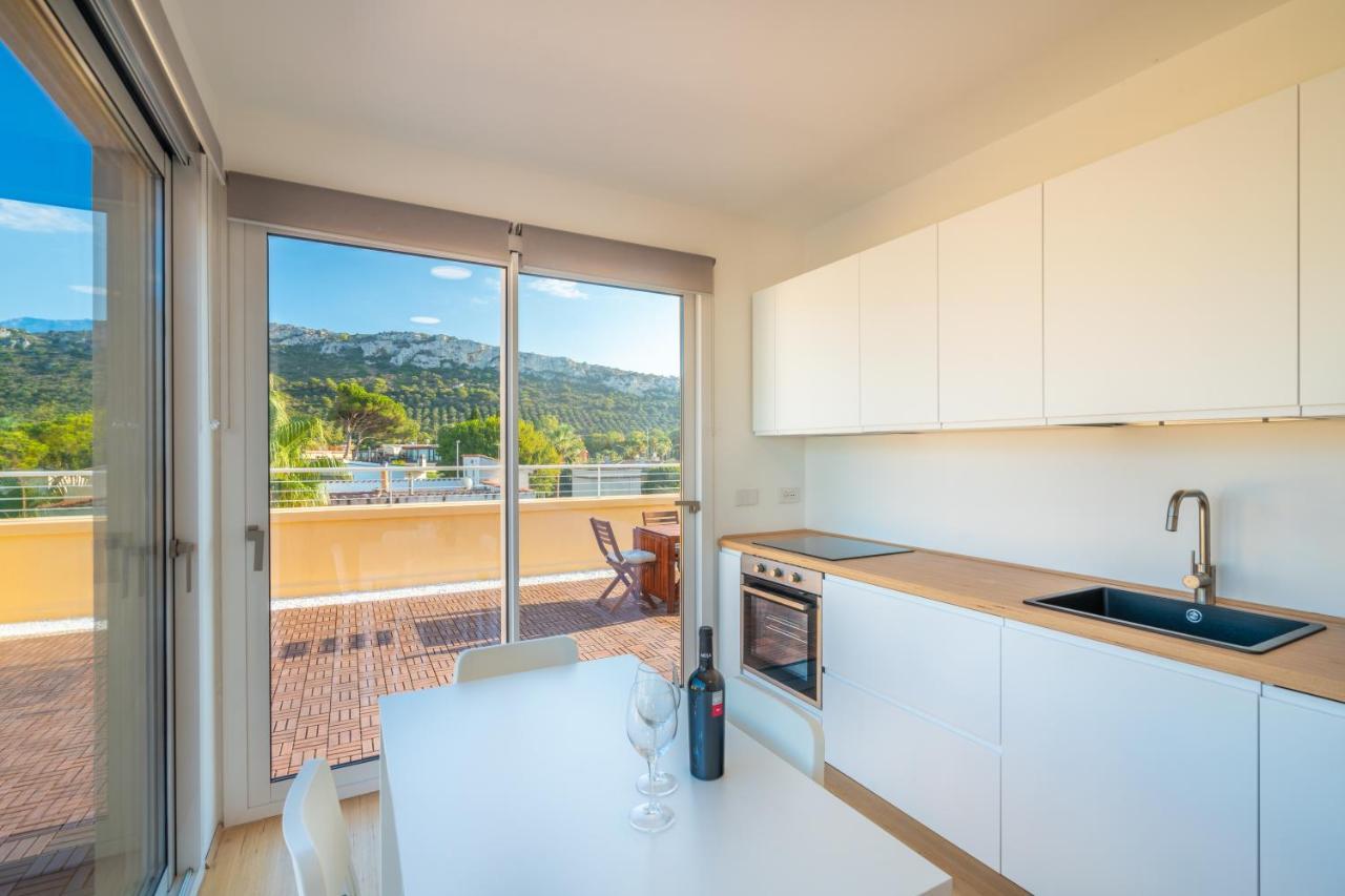 Terrazza Sella Del Diavolo - Vista Mare - Wifi Ac Apartment กาญารี ภายนอก รูปภาพ