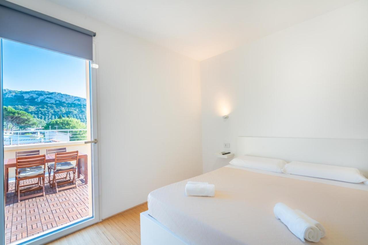 Terrazza Sella Del Diavolo - Vista Mare - Wifi Ac Apartment กาญารี ภายนอก รูปภาพ