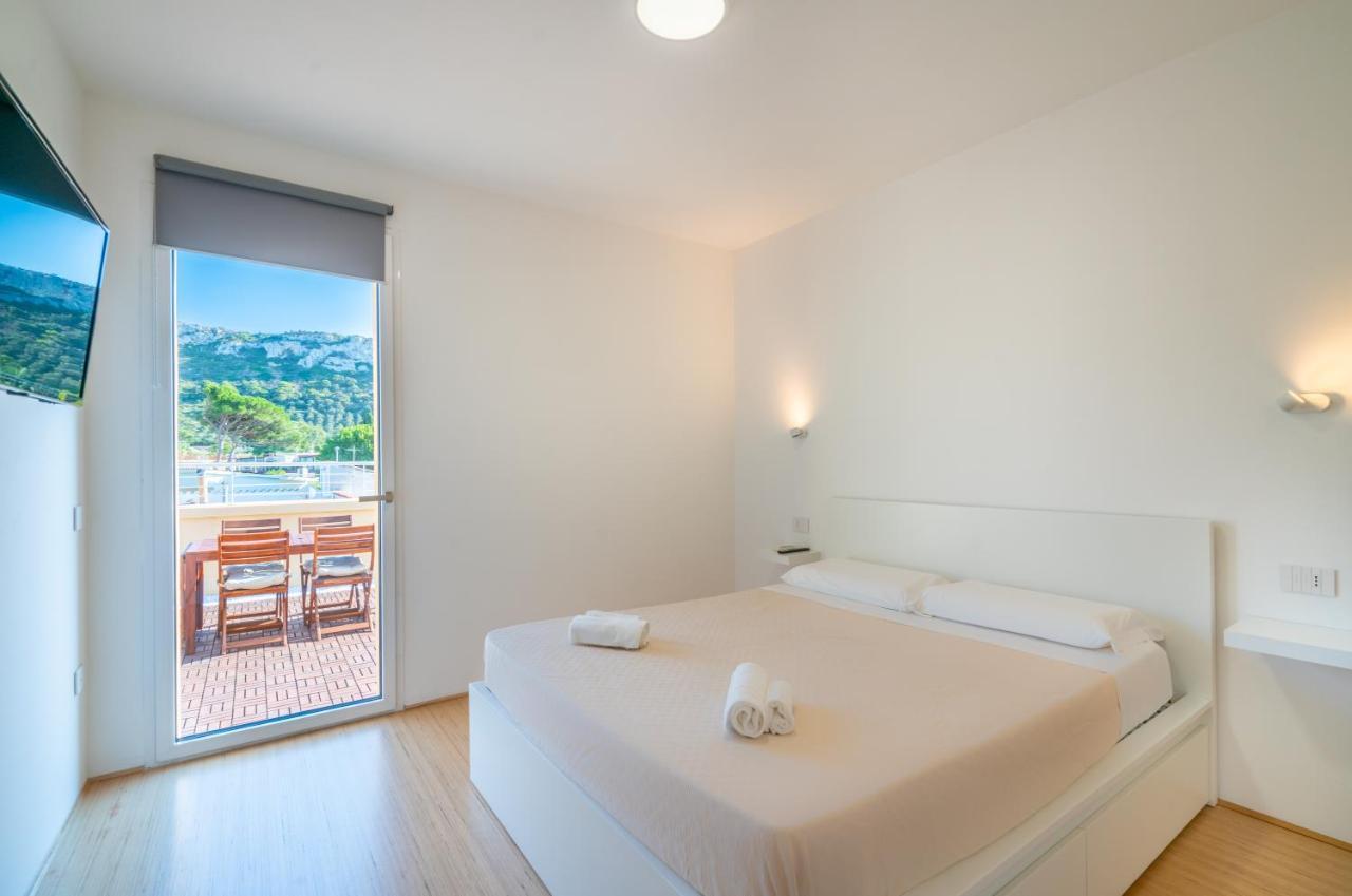 Terrazza Sella Del Diavolo - Vista Mare - Wifi Ac Apartment กาญารี ภายนอก รูปภาพ